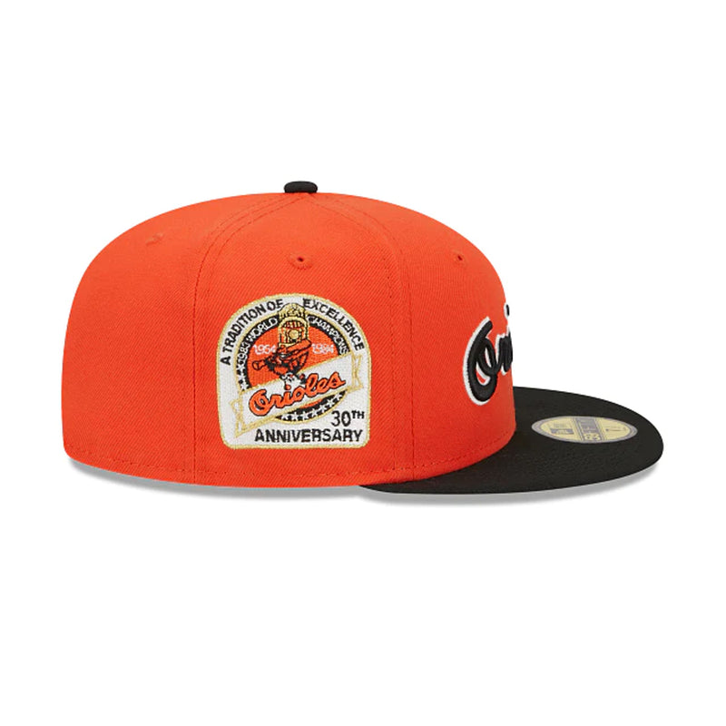 New Era Unisex MLB Baltimore Orioles A tradition Of Excellence 30th Anniversary Retro Script 59Fifty Fitted Hat 60417769 Orange/Black, Green Undervisor