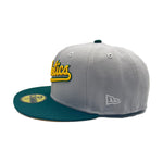 New Era Mens MLB Oakland Athletics 50 Years Athletics 1968-2018 59Fifty Fitted Hat 70761618 Gray Dark/Green, Yellow Undervisor
