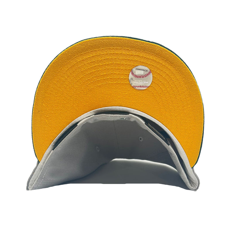 New Era Mens MLB Oakland Athletics 50 Years Athletics 1968-2018 59Fifty Fitted Hat 70761618 Gray Dark/Green, Yellow Undervisor